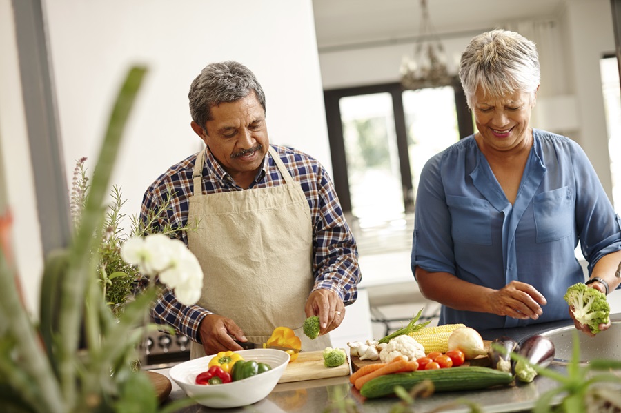 older couple cooking together