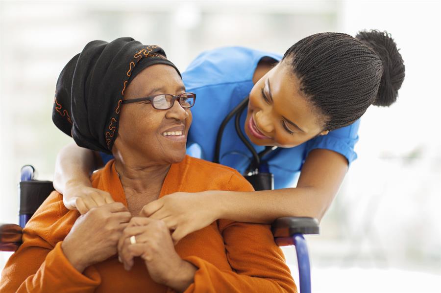 happy senior patient with friendly female nurse